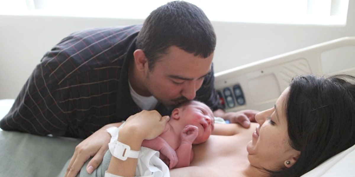 Dad and Mom with new baby