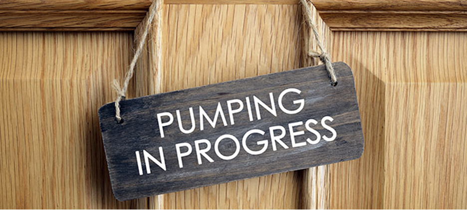 Pumping In Progress sign on door