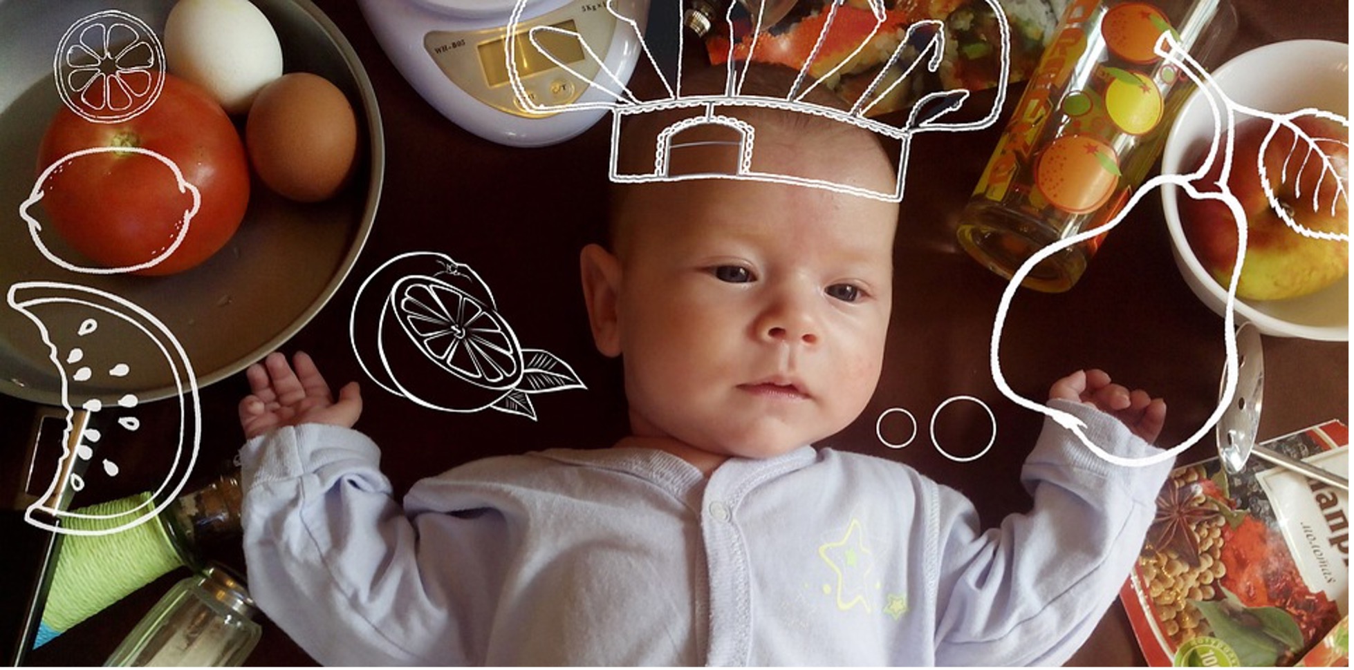 Baby Surrounded by a Variety of Foods