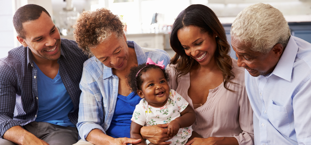 Black family of parents, baby, and grandparents